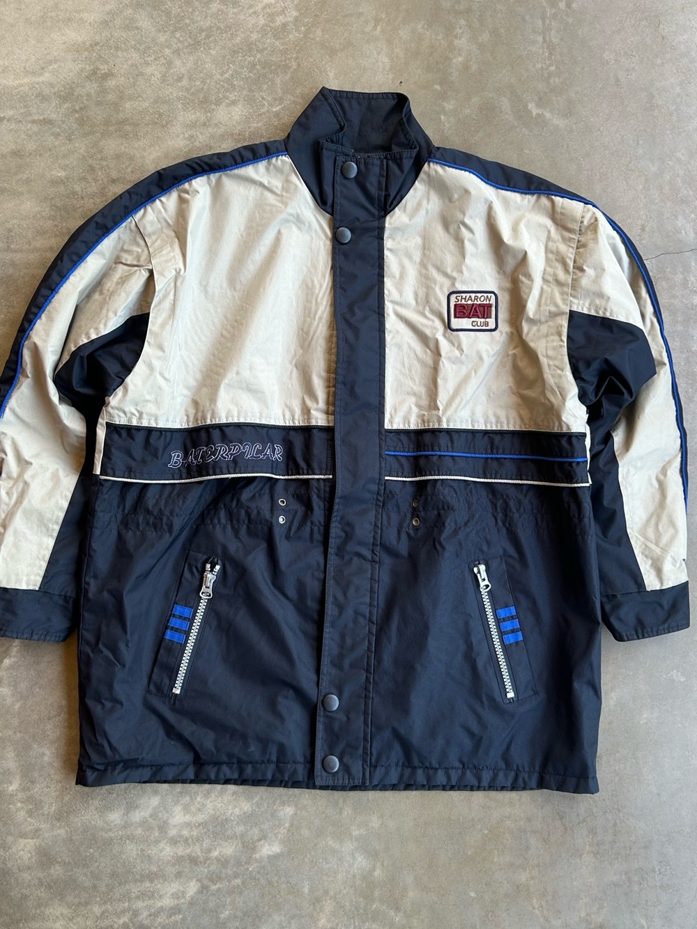 Reversible Bootleg CAT Men's Two-Tone Black and Cream Windbreaker Jacket